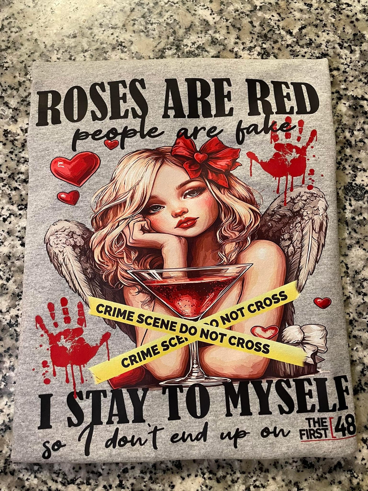 Roses are red people are fake I stay to myself so I don’t end up on the first 48. Graphic shirt.