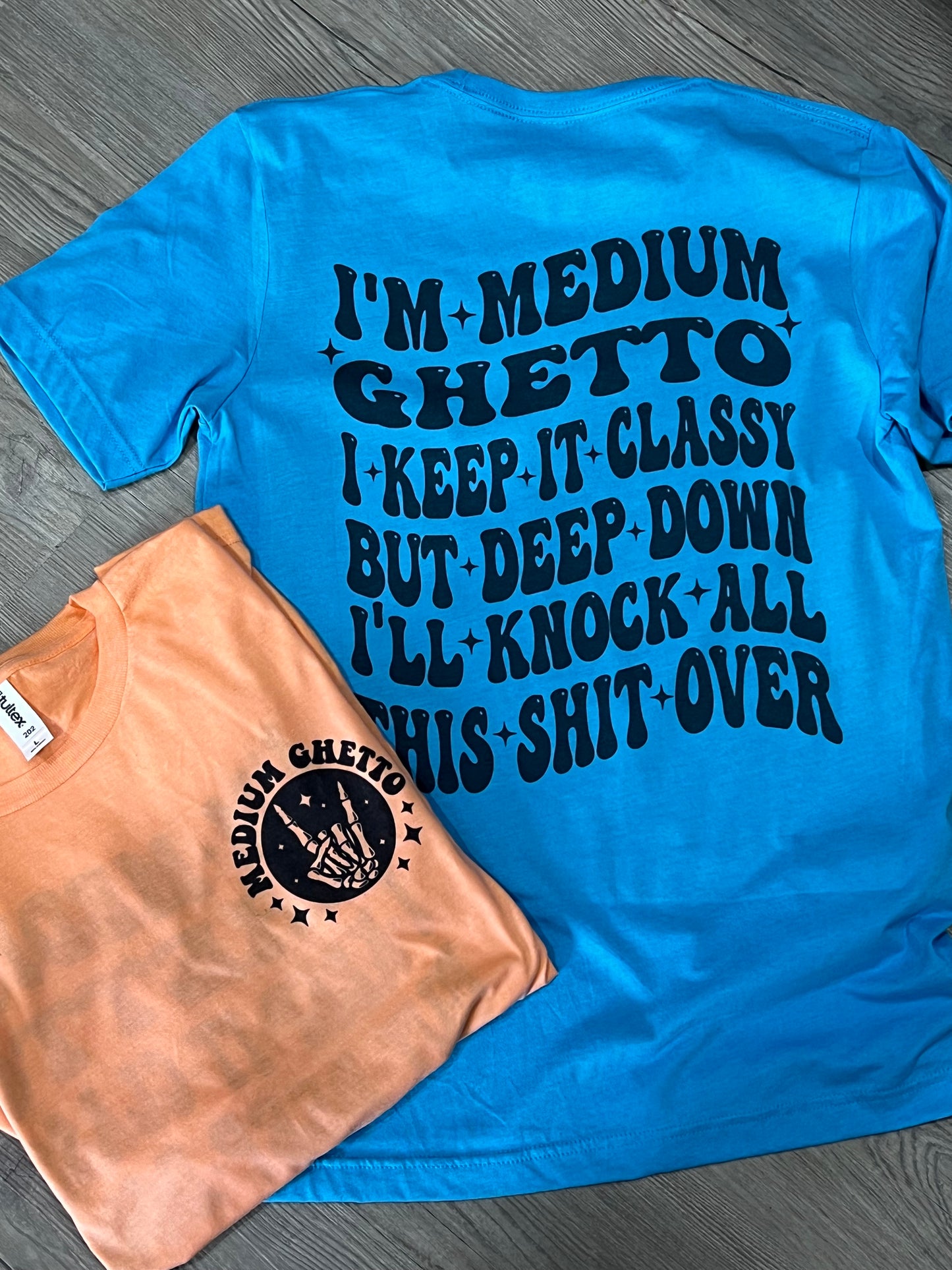 Medium ghetto. I keep it classy but deep down I’ll knock all this shit over. Graphic shirt.