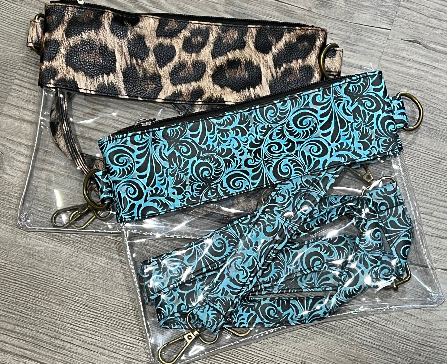 Clear turquoise leather leopard trim crossbody wristlet purse