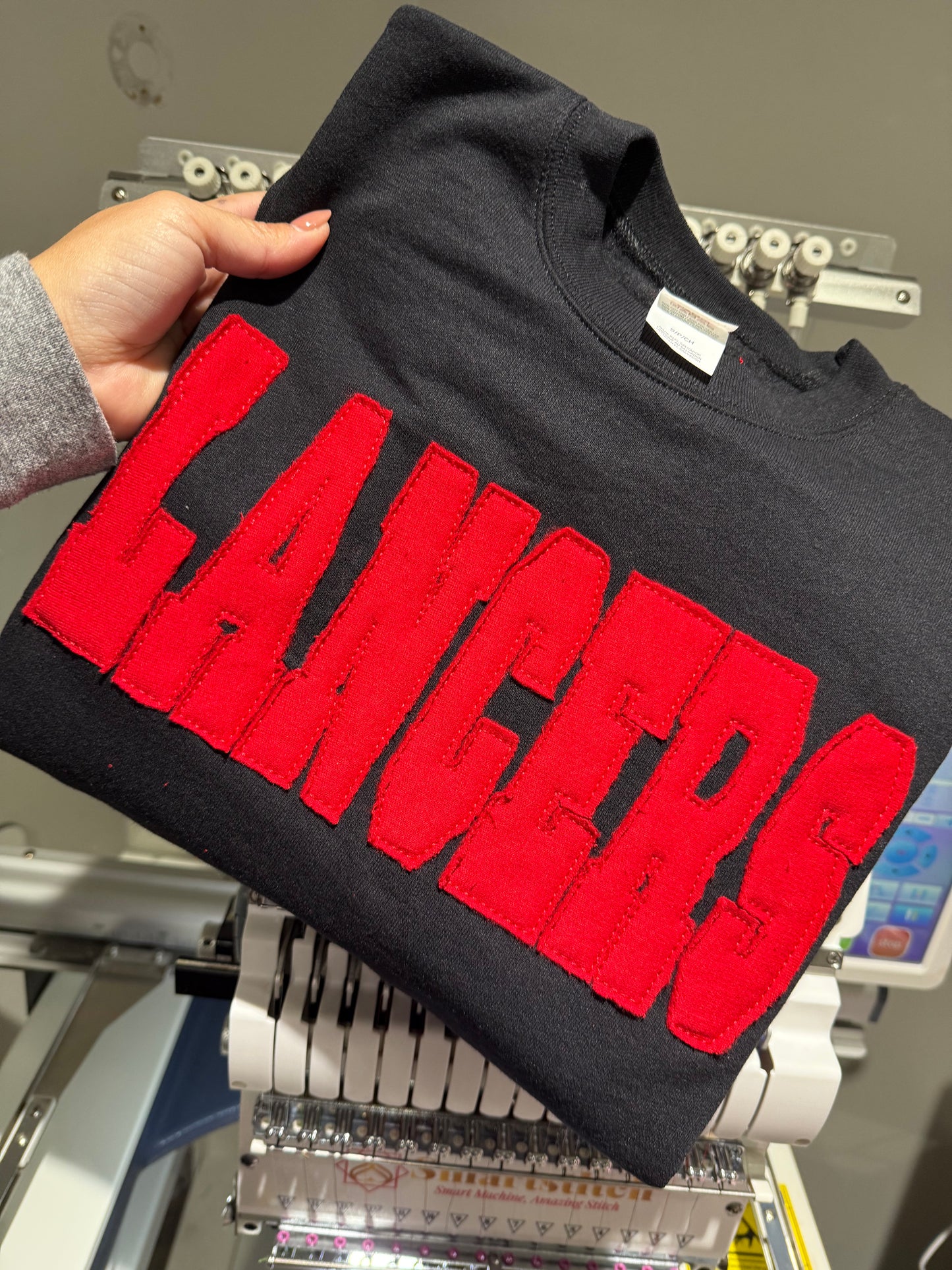 Lancers tone on tone sweater embroidered applique shirt