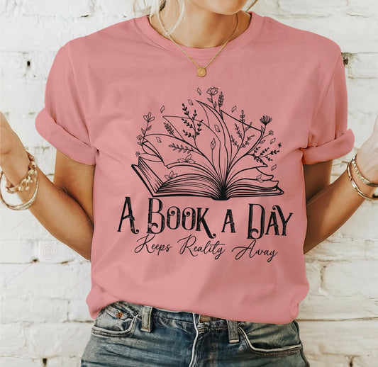 A book a day keeps reality away graphic shirt